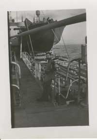 One of the PT boats loaded on a freighter for transport to the Pacific